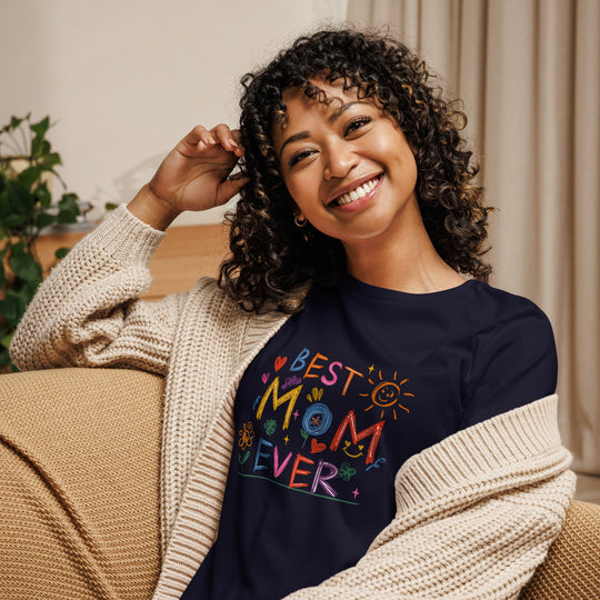 Best Mom Ever women's relaxed fit t-shirt with colorful design, worn by smiling woman indoors.